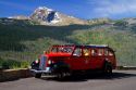 Red Jammer bus on the Going-to-the-Sun Road in Glacier National Park, Montana, USA.