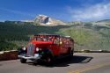 Red Jammer bus on the Going-to-the-Sun Road in Glacier National Park, Montana, USA.