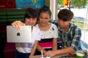 Vietnamese teenagers taking selfies with an ipad in Da Lat, Vietnam.