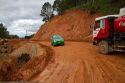 Road made of red clay at a construction site near Da Lat, Vietnam.