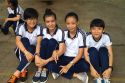 Vietnamese elementary school students wearing uniforms in Nha Trang, Vietnam.